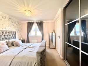 Bedroom One- click for photo gallery